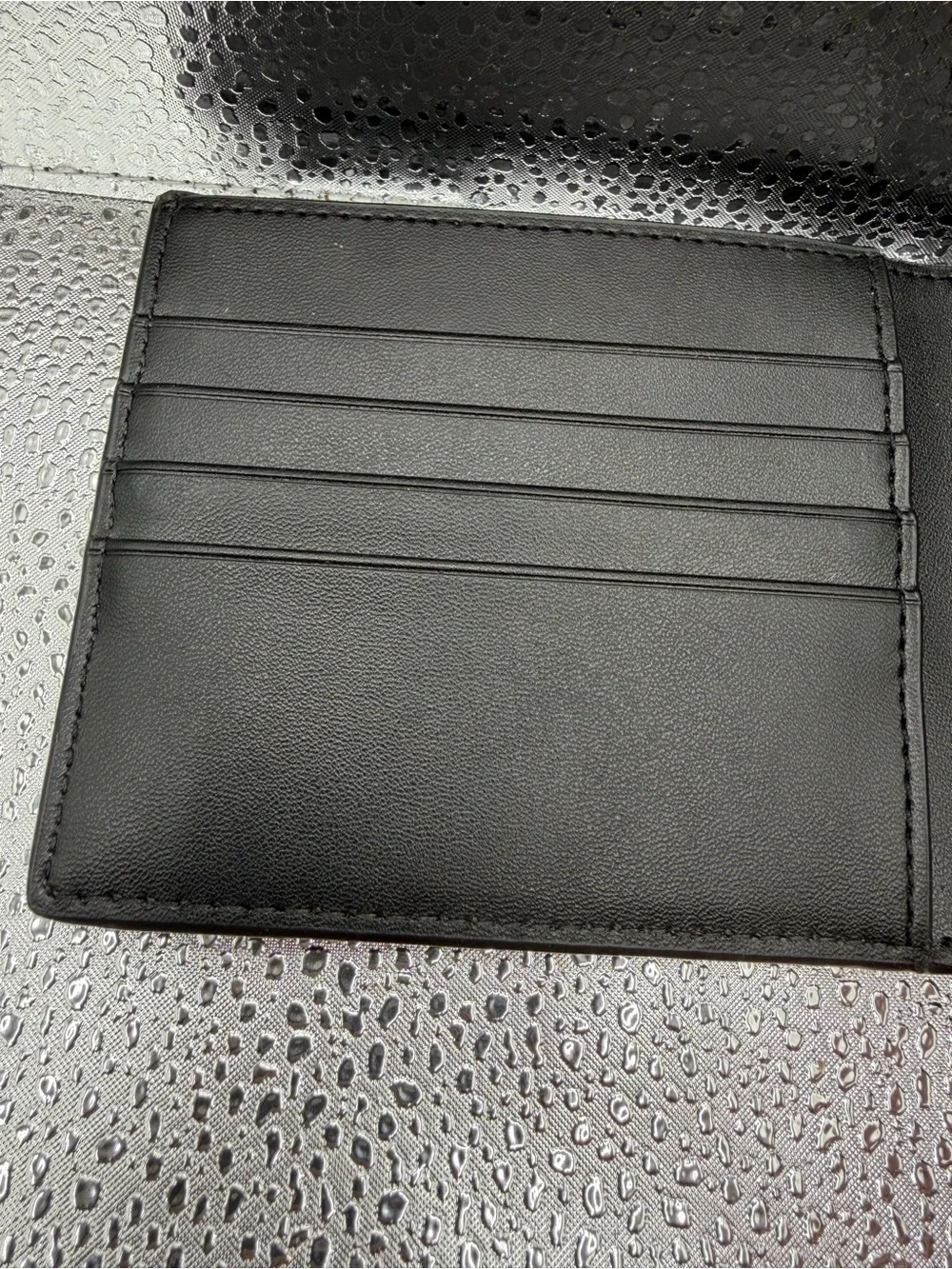 Michael Kors Black Textured Leather Bi-Fold Wallet with Gold Logo